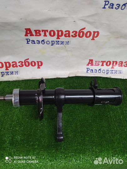 Стойка амортизатора передняя левая Ваз 2190 Гранта