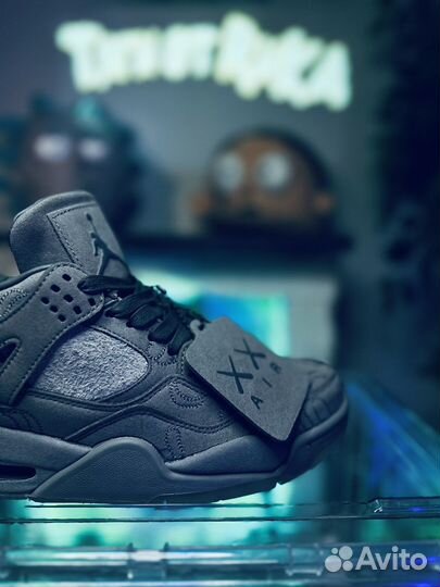 Кроссовки nike air jordan 4 kaws серые