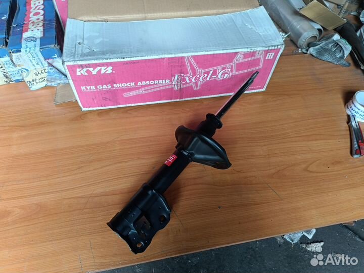 Амортизатор передний левый Mitsubishi Colt/Lancer