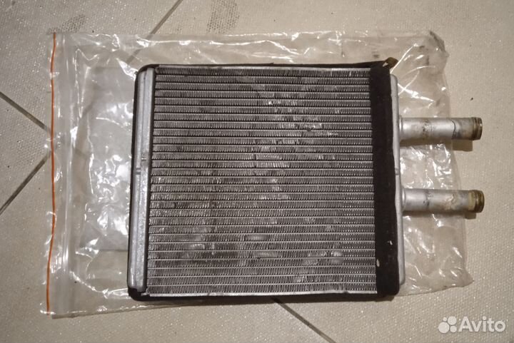 Радиатор отопителя Kia Sportage 1