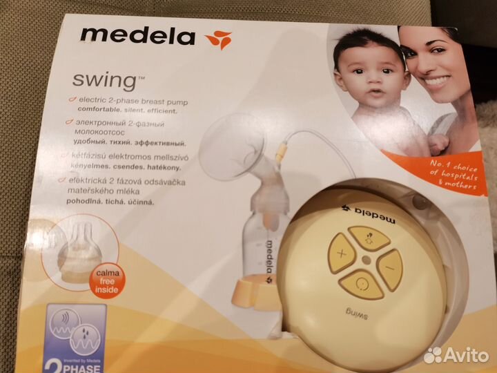 Молокоотсос medela электрический
