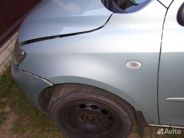 Мазда 2 demio крыло левое