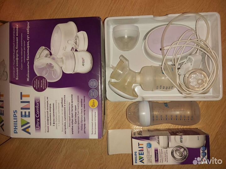 Электронный молокоотсос + бутылочка для кормления