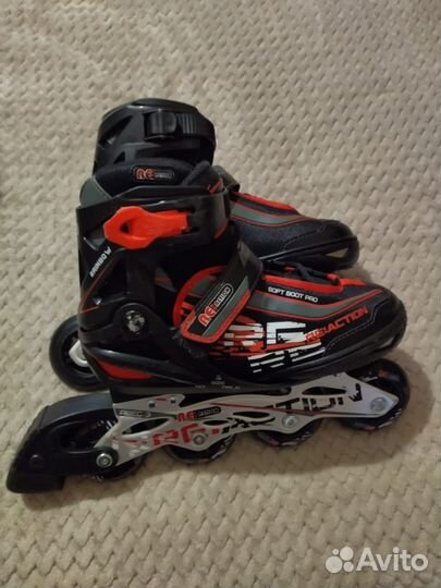 Роликовые коньки