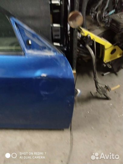 Двери на мазда аксела правая передняя