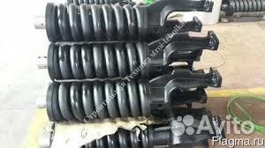 Механизм натяжения гусеницы экскаваторов