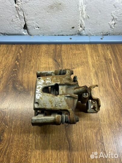 Суппорт тормозной задний левый Ford Mondeo III 2.0