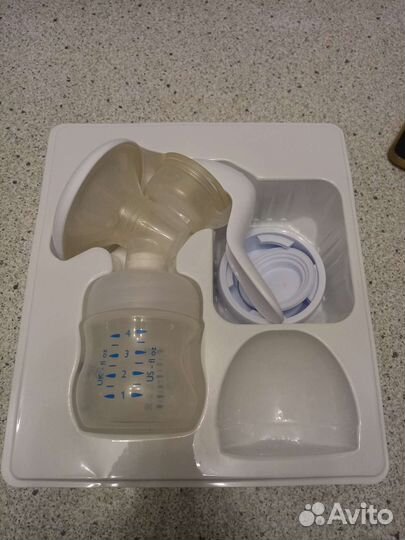 Молокоотсос ручной и накладки на грудь новые