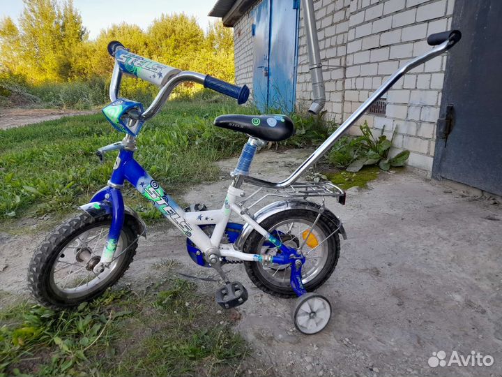 Детский велосипед с родительской ручкой
