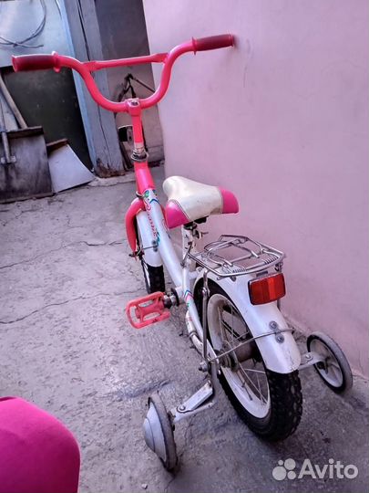 Велосипед детский 4-7 лет розовый четырехколесный