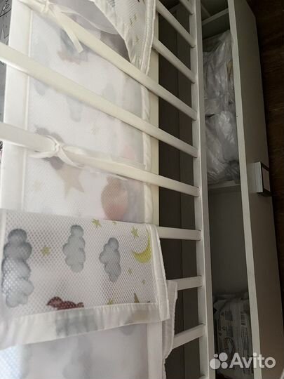 Детская кроватка с поперечным маятником