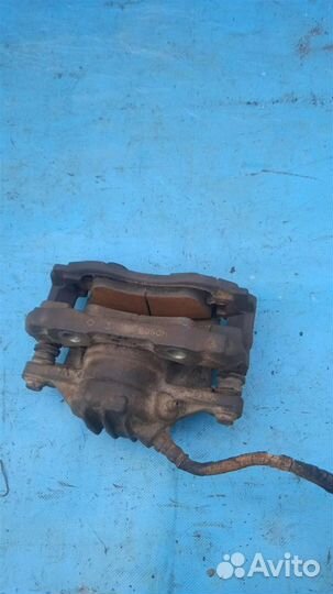 Суппорт тормозной передний левый Peugeot Partner