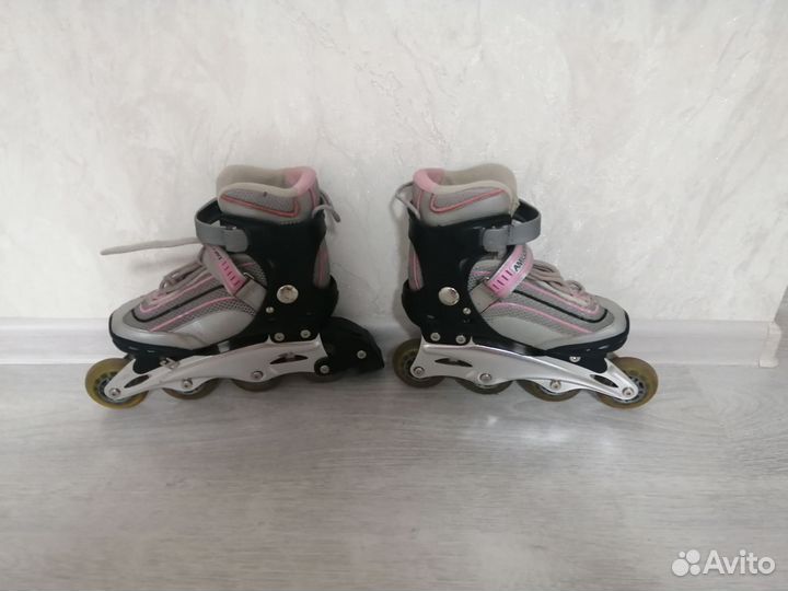 Коньки роликовые