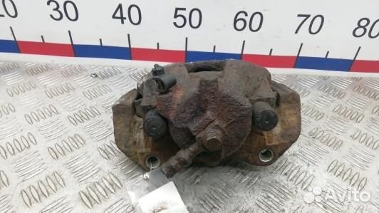 Суппорт тормозной передний левый opel astra G (ISE