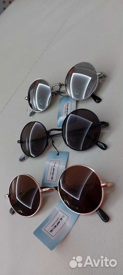 Солнцезащитные очки круглой формы