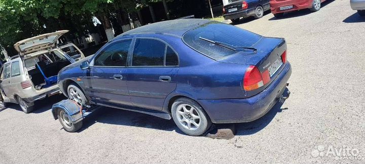 Крышка багажника лифтбэк Mitsubishi Carisma 1999г