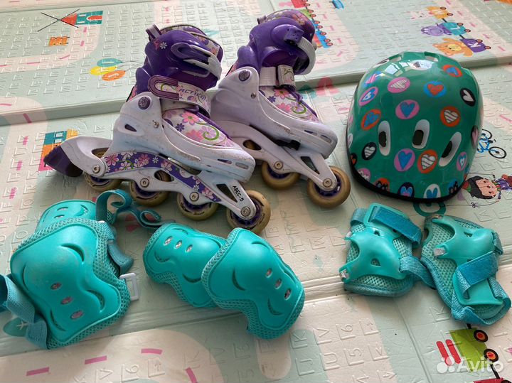 Роликовые коньки