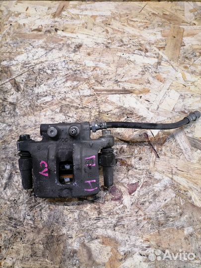 Суппорт задний правый Mitsubishi Lancer X