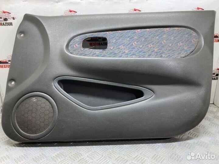 Обшивка боковой двери передняя правая Kia Spectra