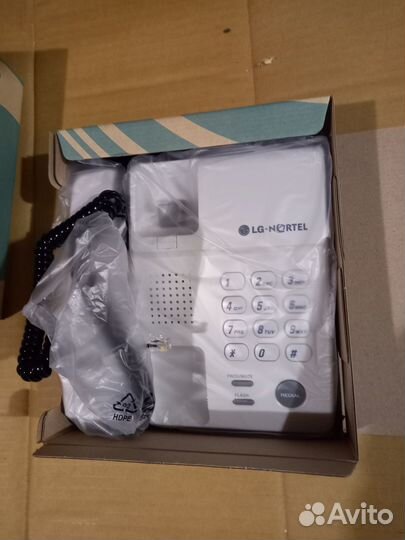 Проводной телефон