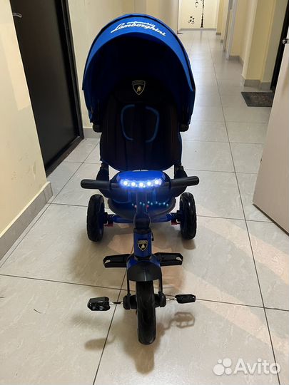 Трехколесный велосипед с ручкой