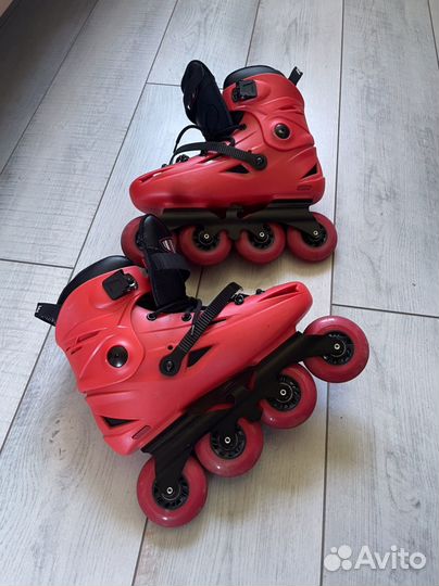 Коньки роликовые