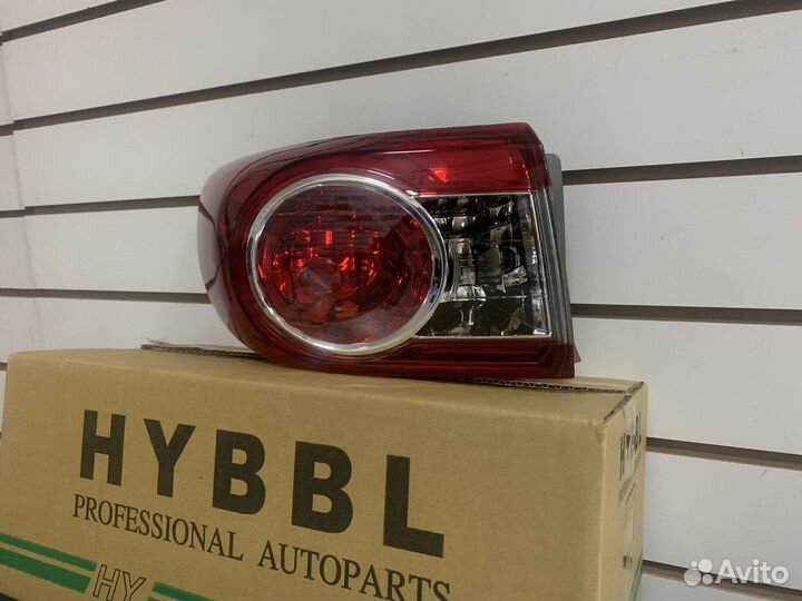 Фонарь задний наружный левый Toyota Corolla E150