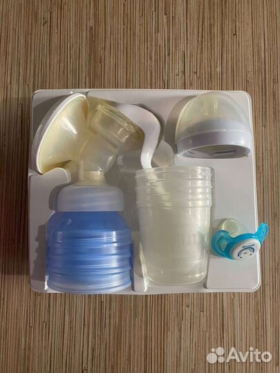 Молокоотсос avent ручной + накладки 