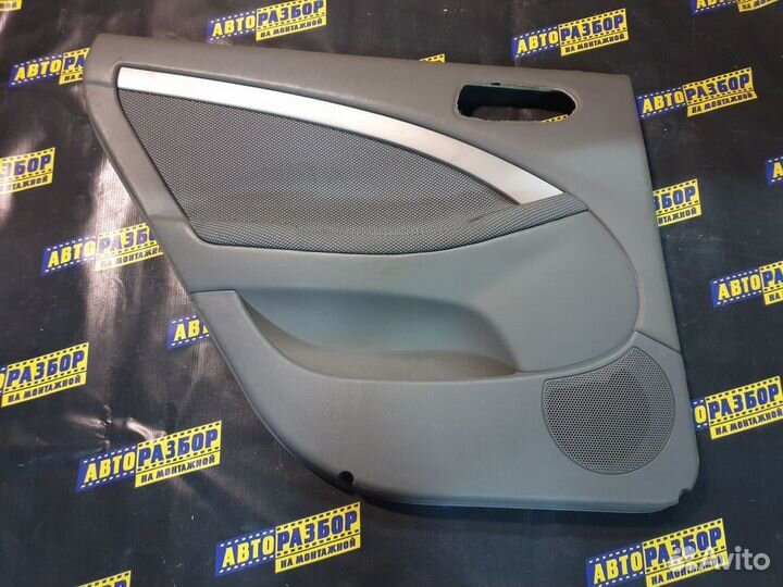Обшивка двери задняя левая Шевроле Лачетти