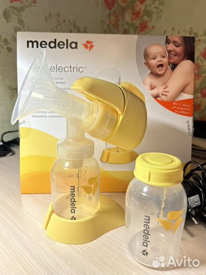 Молокоотсос medela электрический