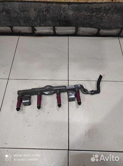 Топливная рампа с форсунками Мазда bk 1.6