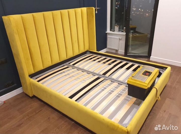 Кровать с подъемным механизмом