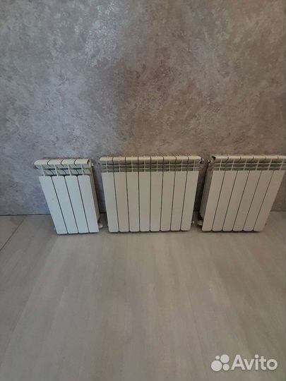 Люстры и алюминиевая батарея