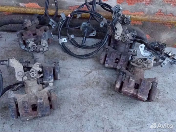 Суппорт задний левый и правый Mazda 6 GH