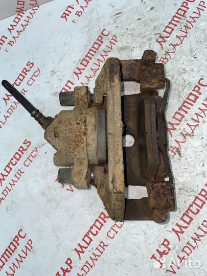 Суппорт тормозной передний левый Ford Escape L3