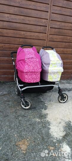 Двойная детская коляска