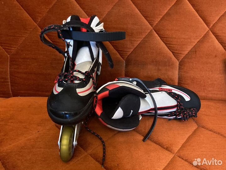 Роликовые коньки