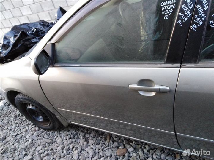 Стекло двери переднее левое Toyota Corolla NZE121