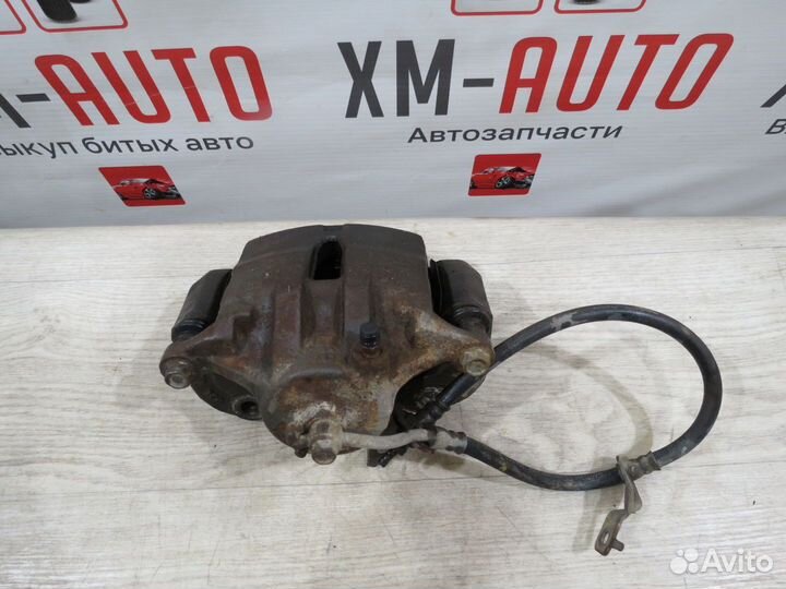 Суппорт тормозной передний правый KIA Sportage 3