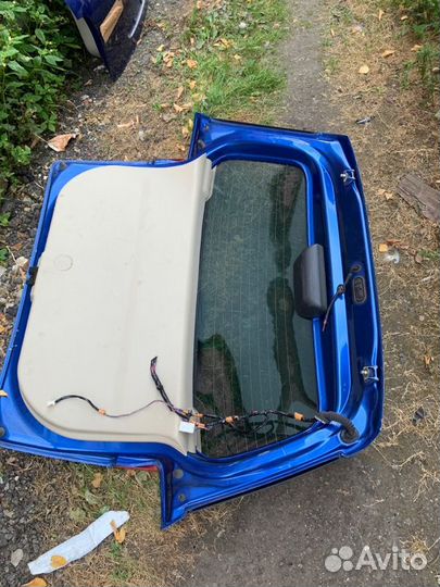 Дверь багажника Mazda Demio