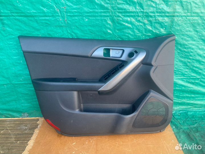 Обшивка двери передней левой Kia Cerato 2009-2013