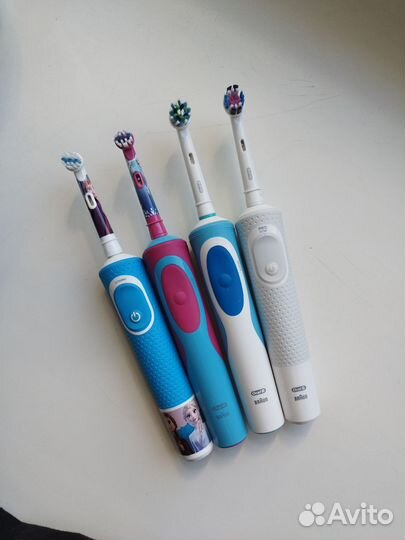 Новая электрическая зубная щетка oral b