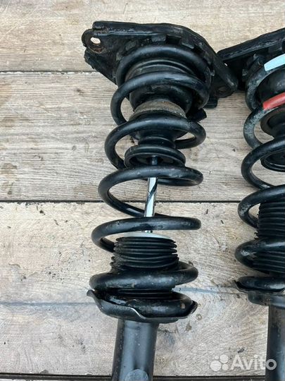 Амортизатор задний Nissan Almera N16 1.5 2004