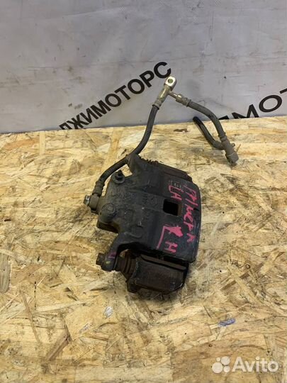 Суппорт передний левый Primera P12