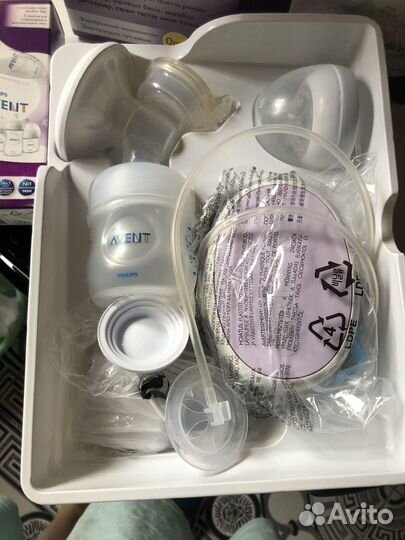 Молокоотсос электрический новый