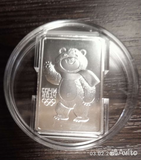 Монеты серебряные31,1г, значок олимпиада 80