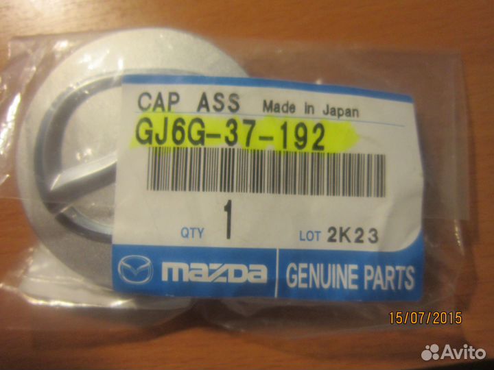 Эмблема литого диска Mazda