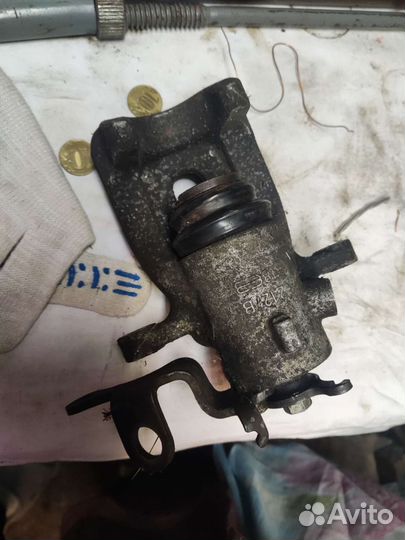 Суппорт задний citroen Peugeot берлинго партнер