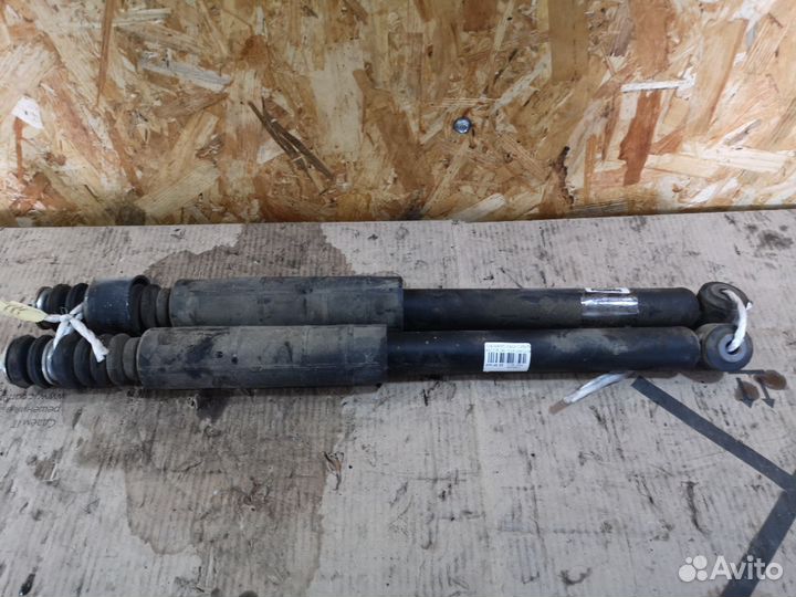 Амортизатор задний Nissan March AK12