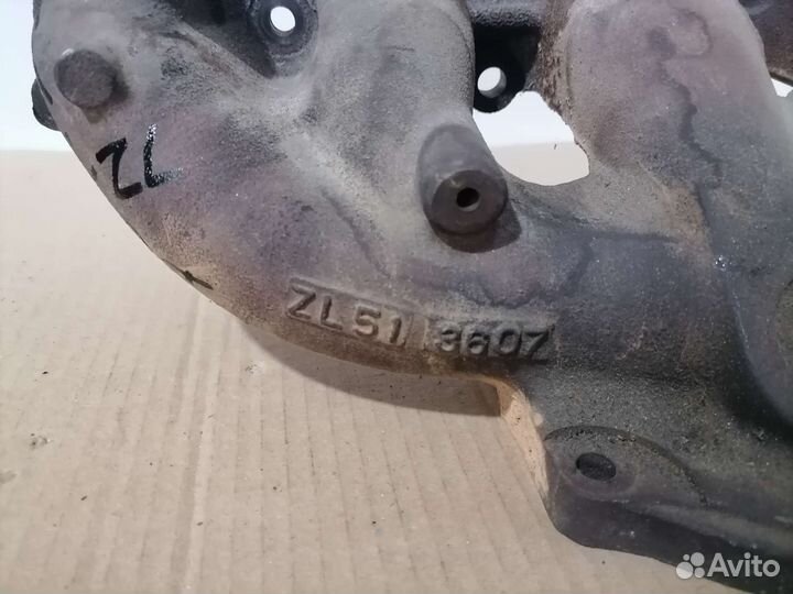 Колектор выпускной Mazda Familia ZL